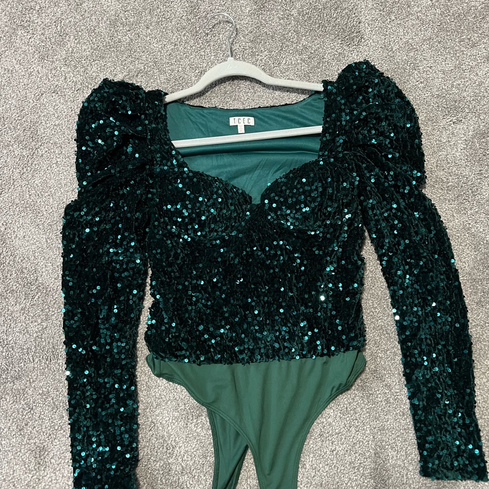 These three boutique green sequins bodysuit